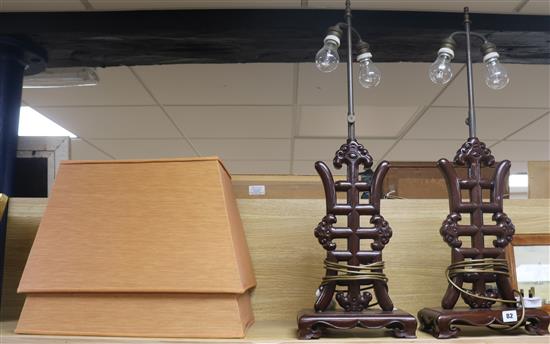 A pair of Chinese hardwood table lamps
